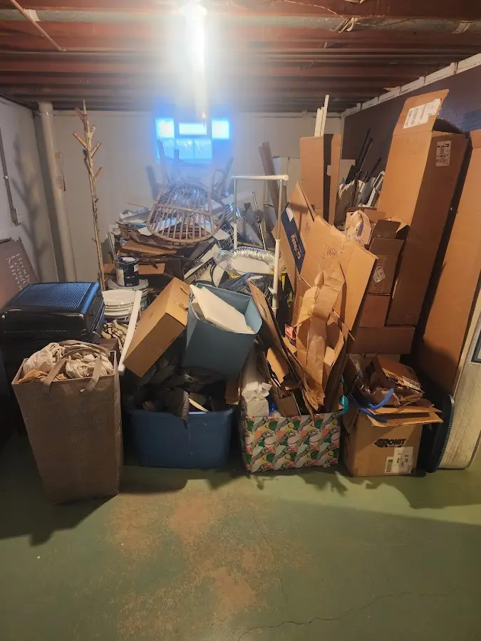 Roll-off dumpster container at job site for 2 Yard Dumpster Rental in Nikiski